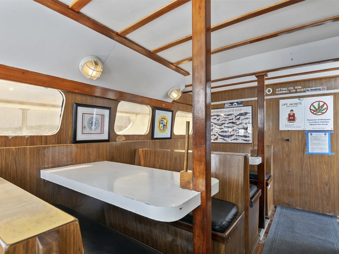 Interior dining and seating area aboard Sea Trek for private charters