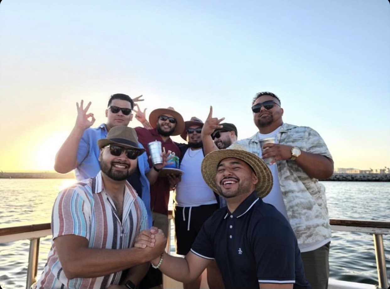 Friends celebrating on Sea Trek during a private sunset charter